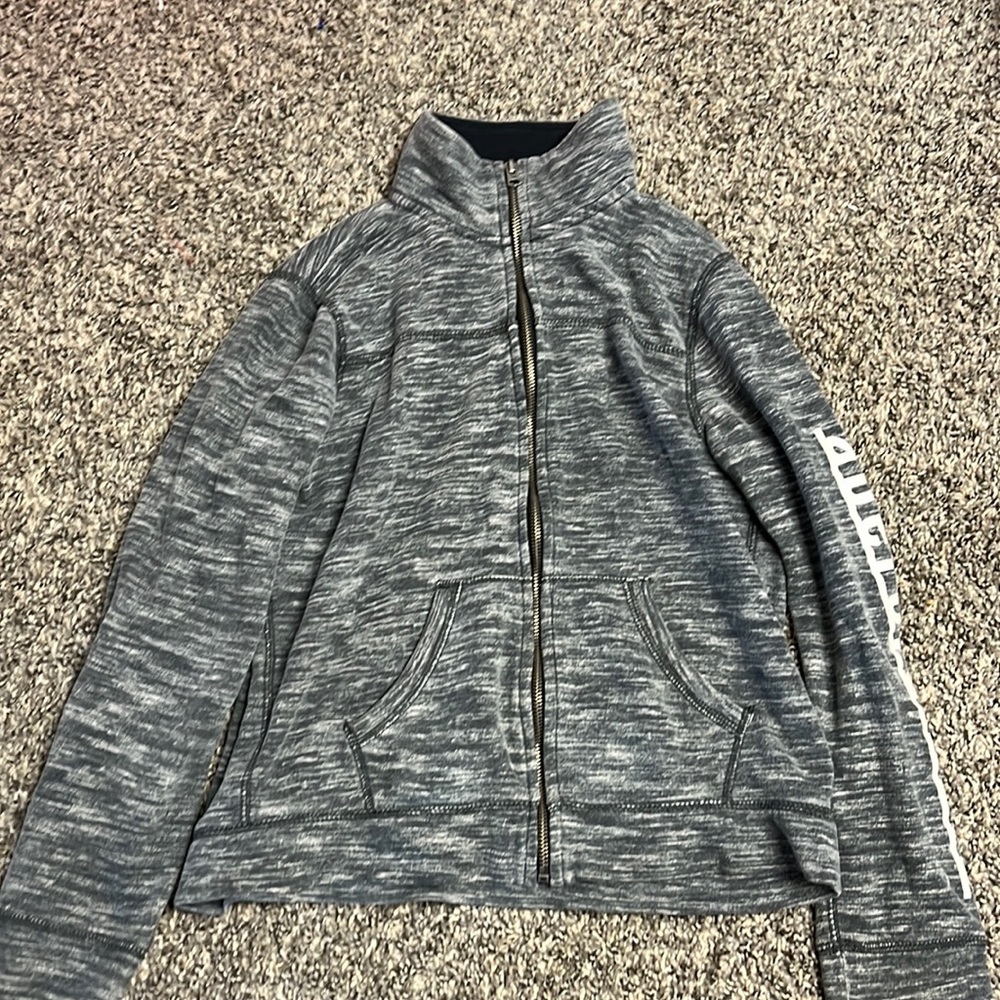 grey zip up jacket